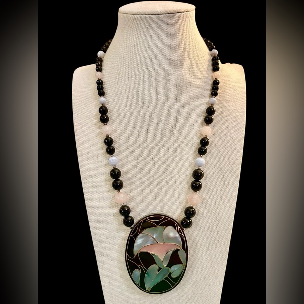 Handcrafted Green and Black Pendant Necklace with Pink Accents